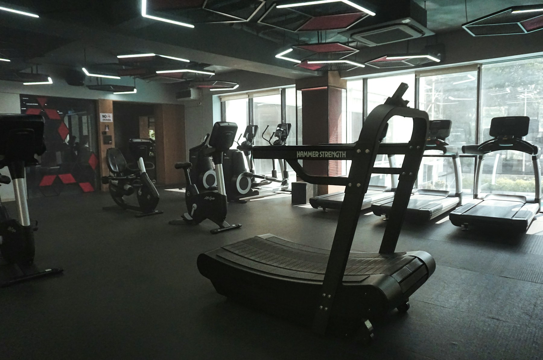 Modern gym with treadmills and strength equipment